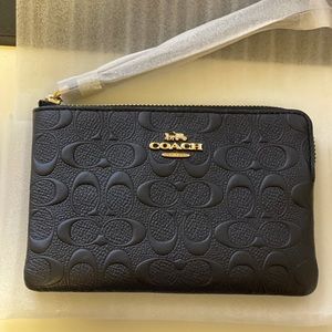 Coach Zip Embossed Corner Wristlet